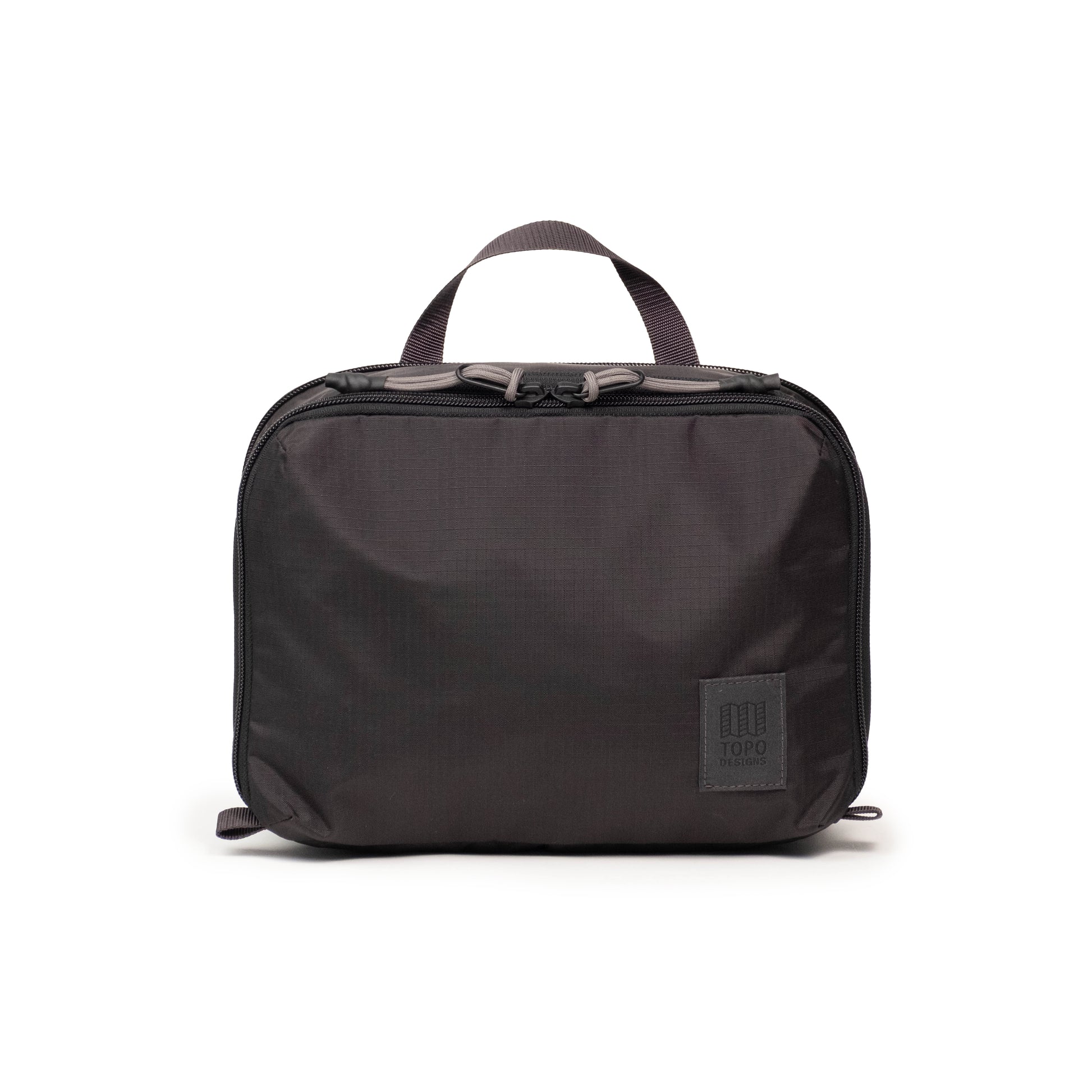 Front View of Topo Designs Global Compression Pack Bag 5L in "Black / Black"