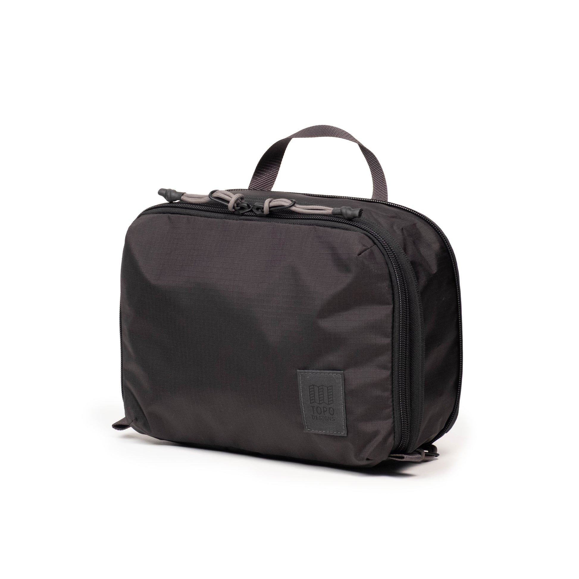 Front View of Topo Designs Global Compression Pack Bag 5L in "Black / Black"