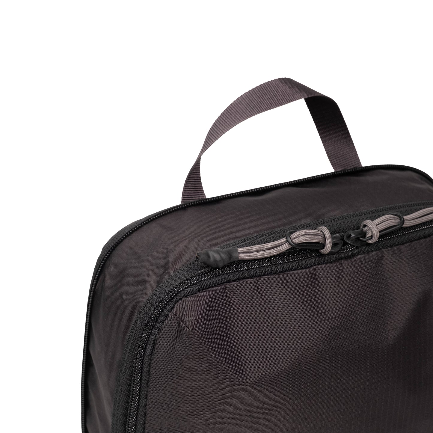 General Detail shot of Topo Designs Global Compression Pack Bag 5L in "Black / Black"