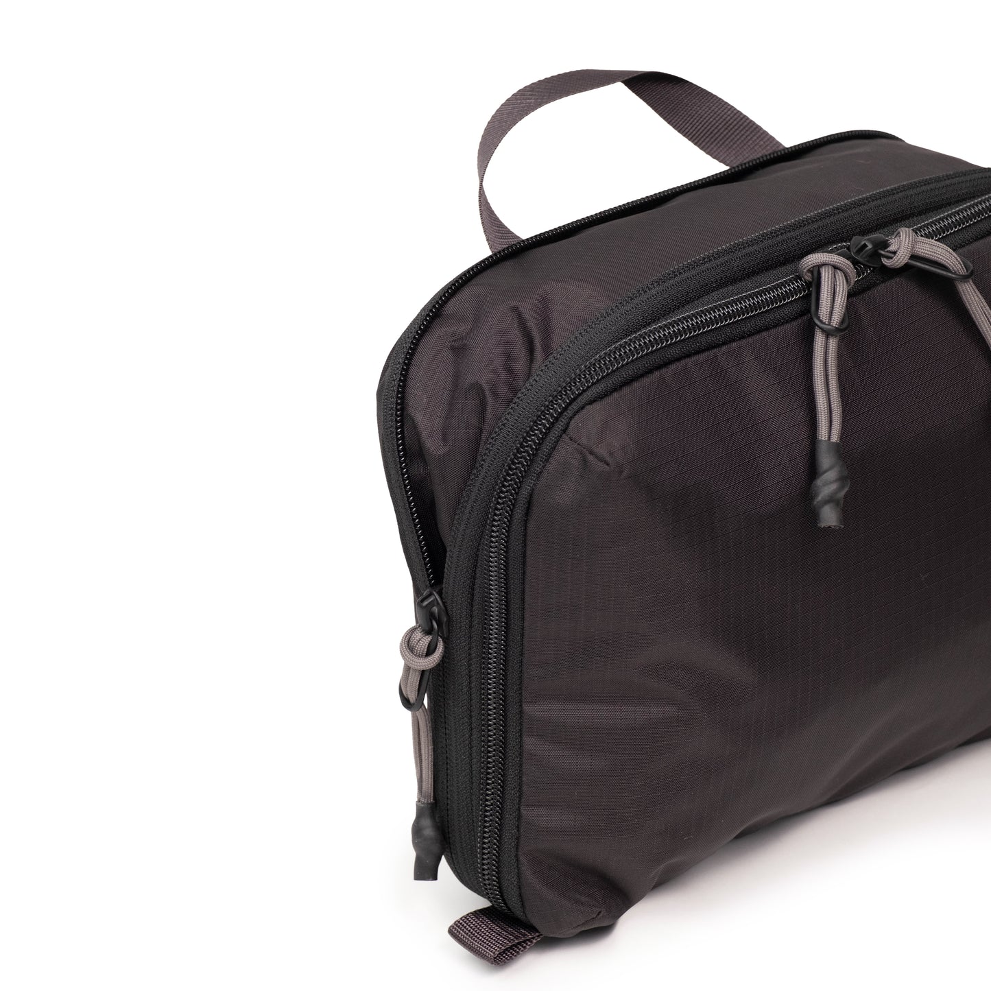 General Detail shot of Topo Designs Global Compression Pack Bag 5L in "Black / Black"