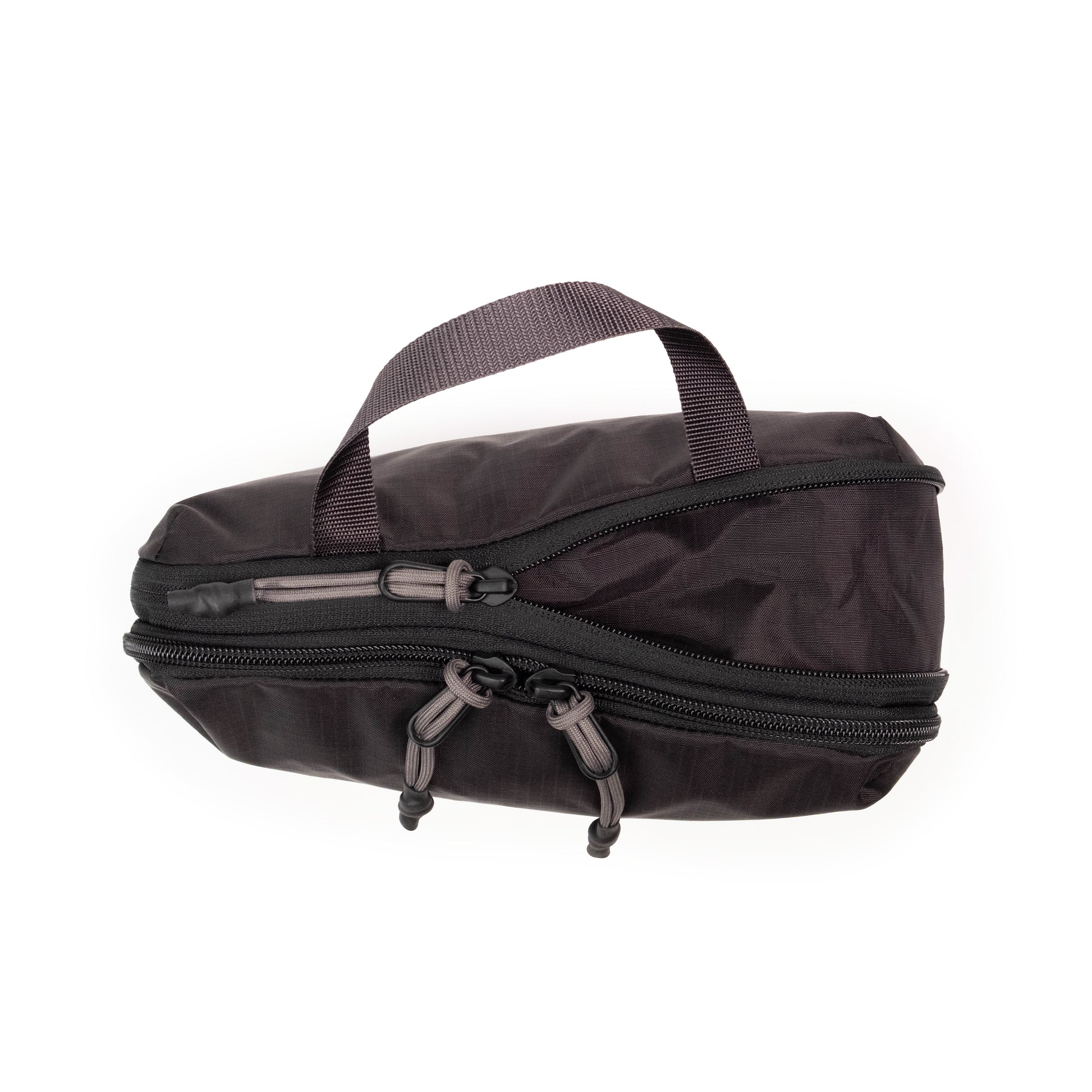General Detail shot of Topo Designs Global Compression Pack Bag 10L in "Black / Black"