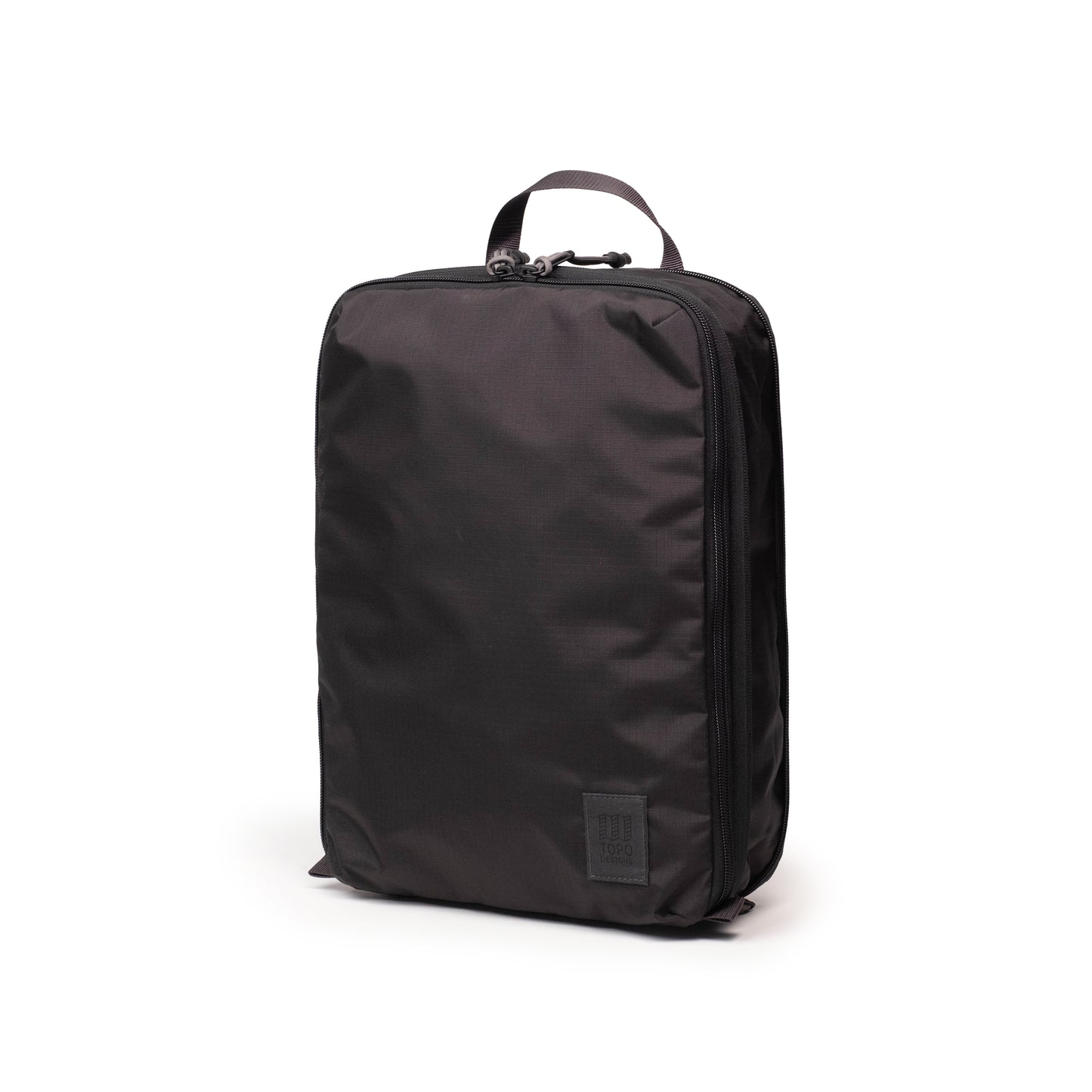 Front View of Topo Designs Global Compression Pack Bag 10L in "Black / Black"