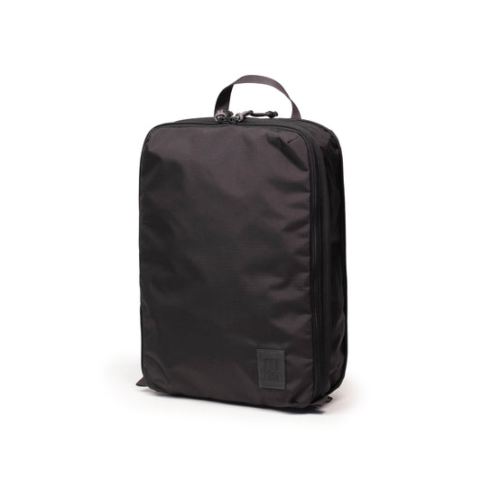 Front View of Topo Designs Global Compression Pack Bag 10L in "Black / Black"