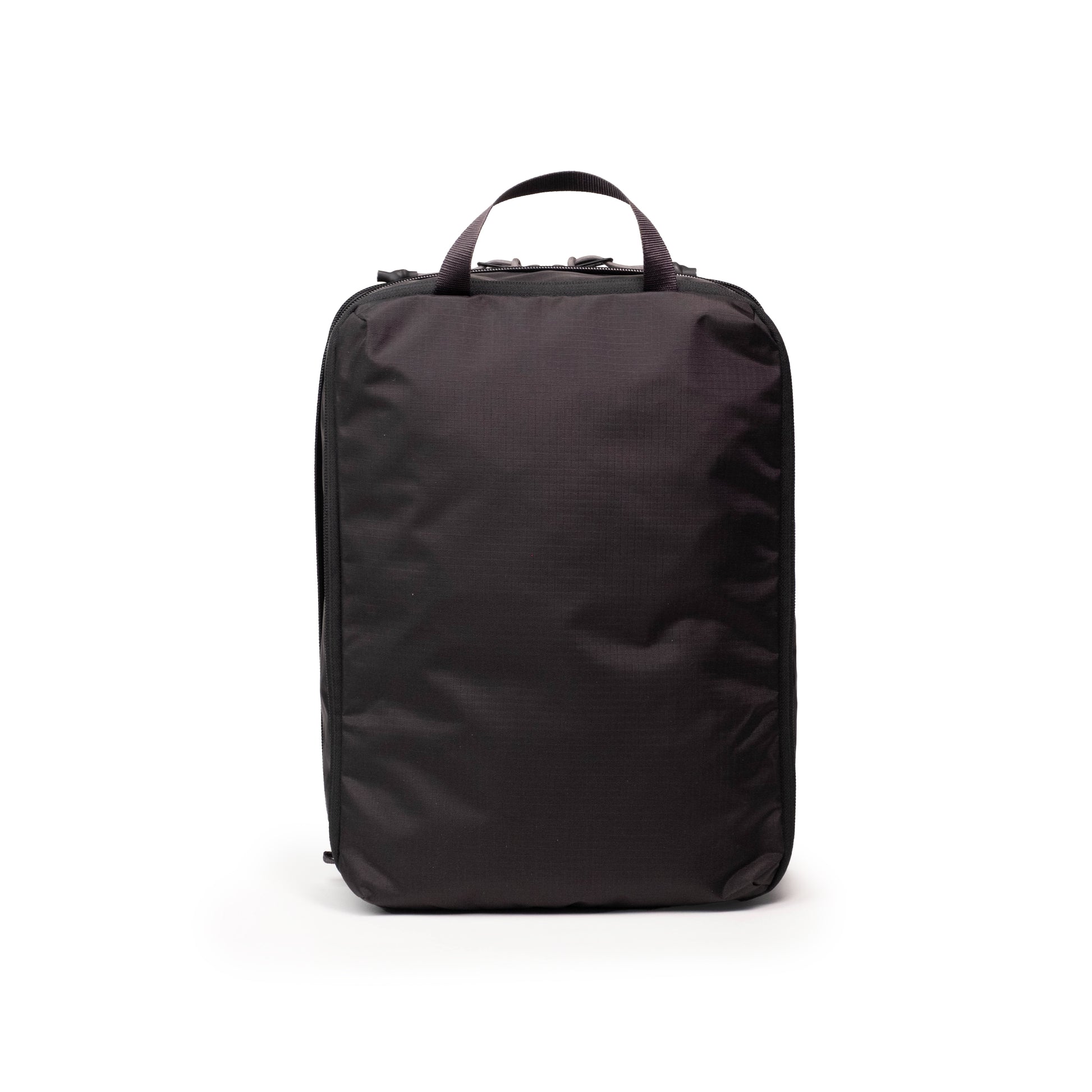 Back View of Topo Designs Global Compression Pack Bag 10L in "Black / Black"