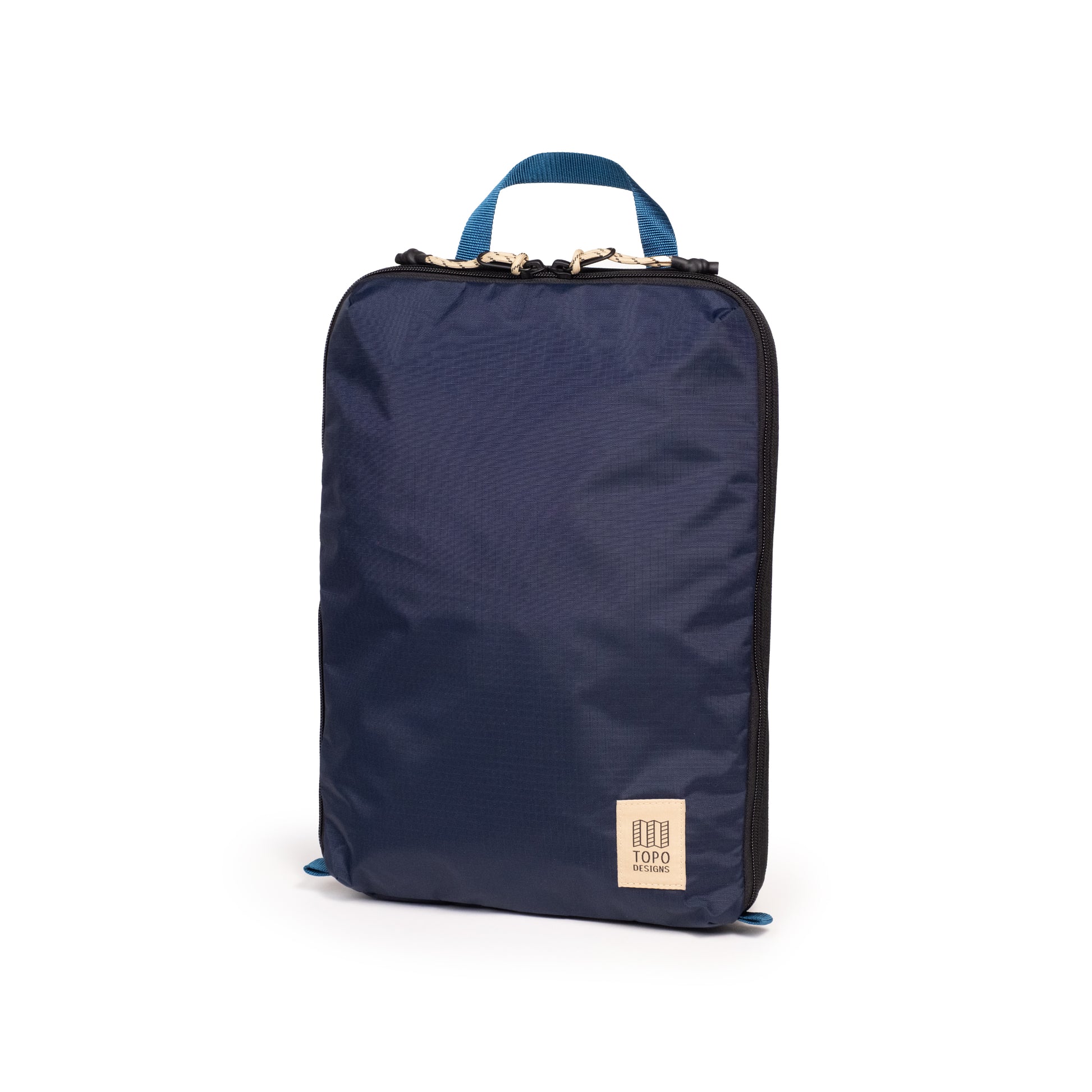 Front View of Topo Designs Global Compression Pack Bag 10L in "Navy / Sahara"