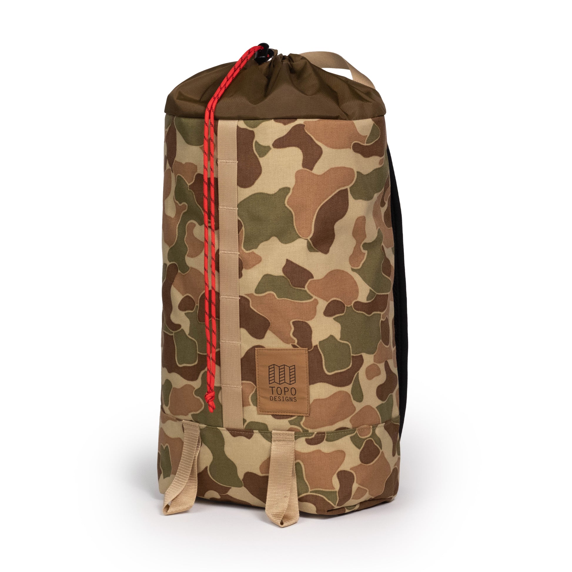 Quarter View of Topo Designs Cosmos Backpack in "Duck Camo"