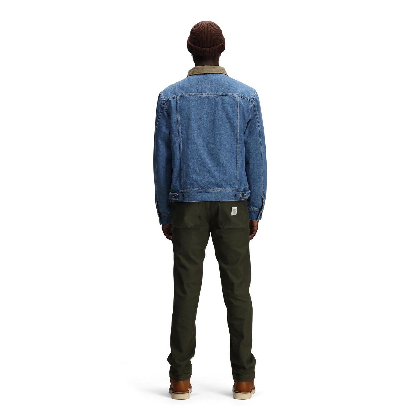 General back model shot of Topo Designs Sightseer Jean Jacket - Men's in "Mid Denim"