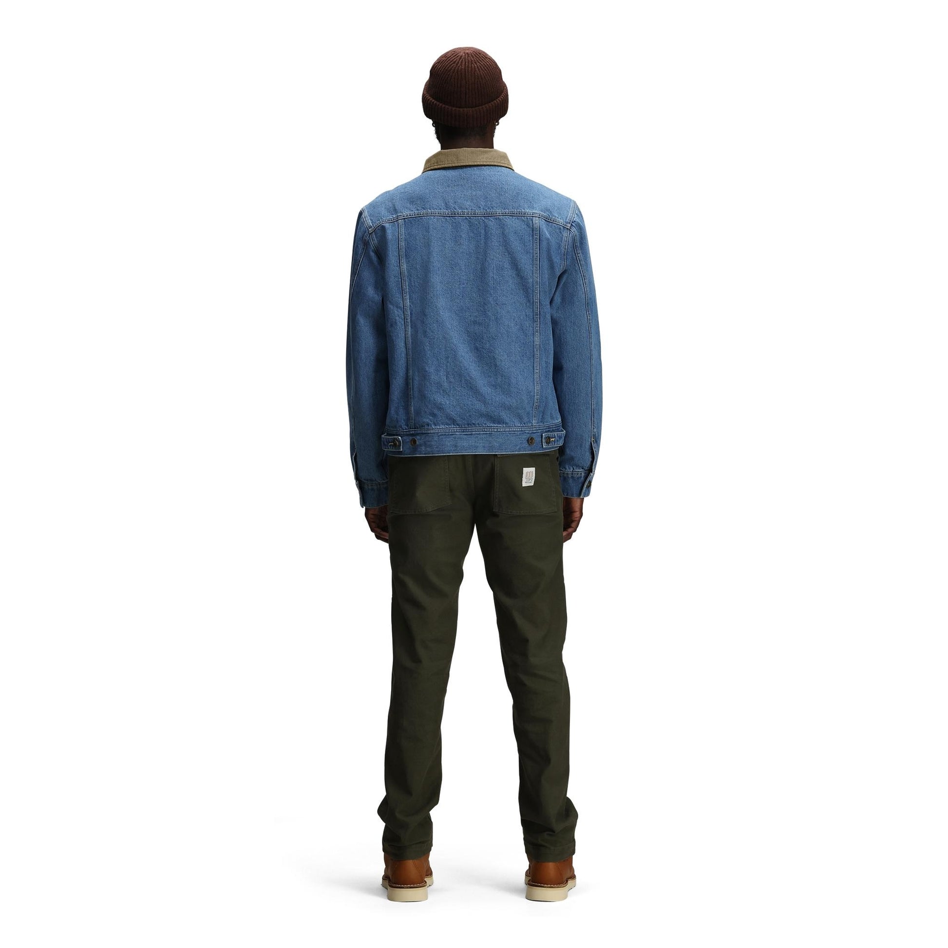 General back model shot of Topo Designs Sightseer Jean Jacket - Men's in "Mid Denim"