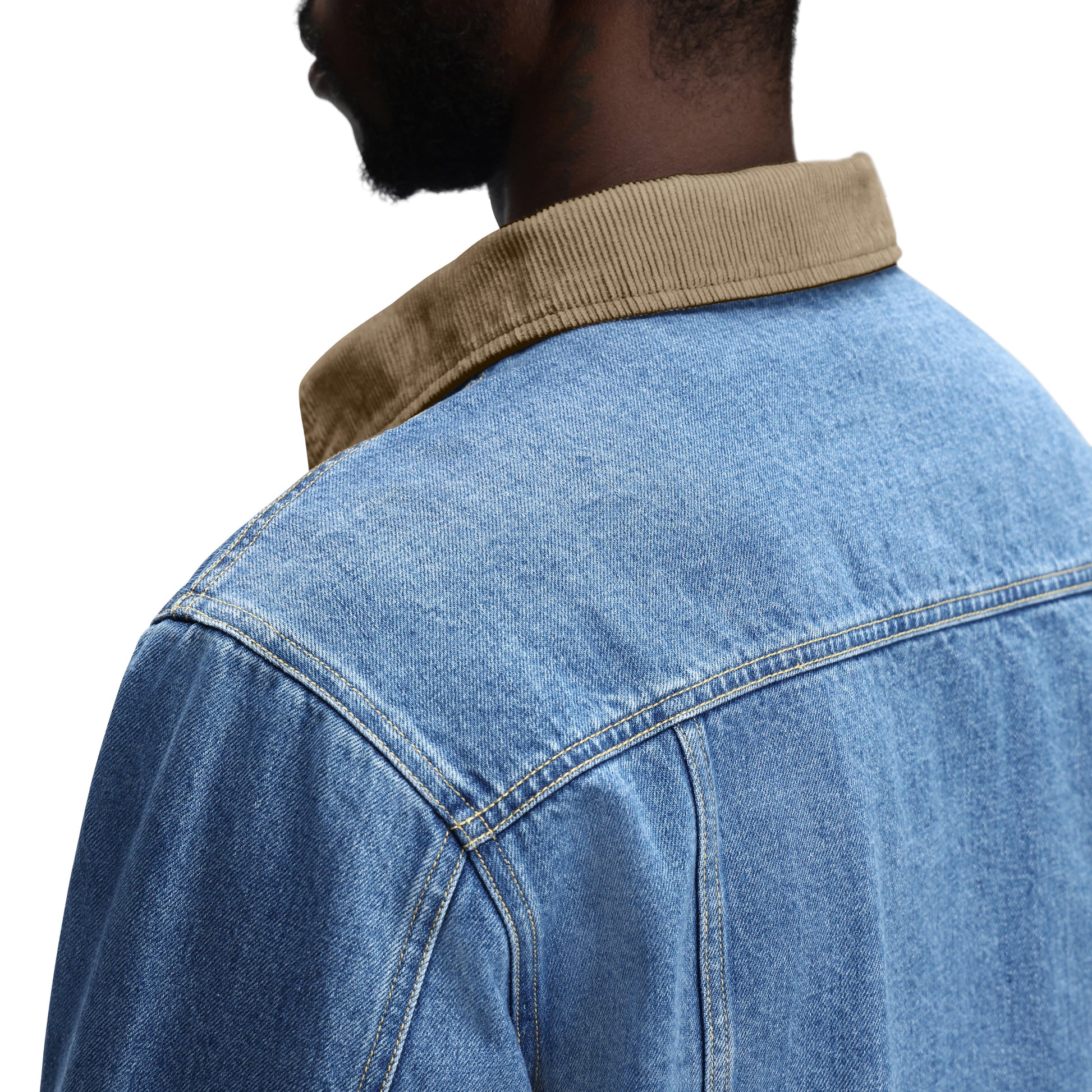 General Detail shot of Topo Designs Sightseer Jean Jacket - Men's in "Mid Denim"