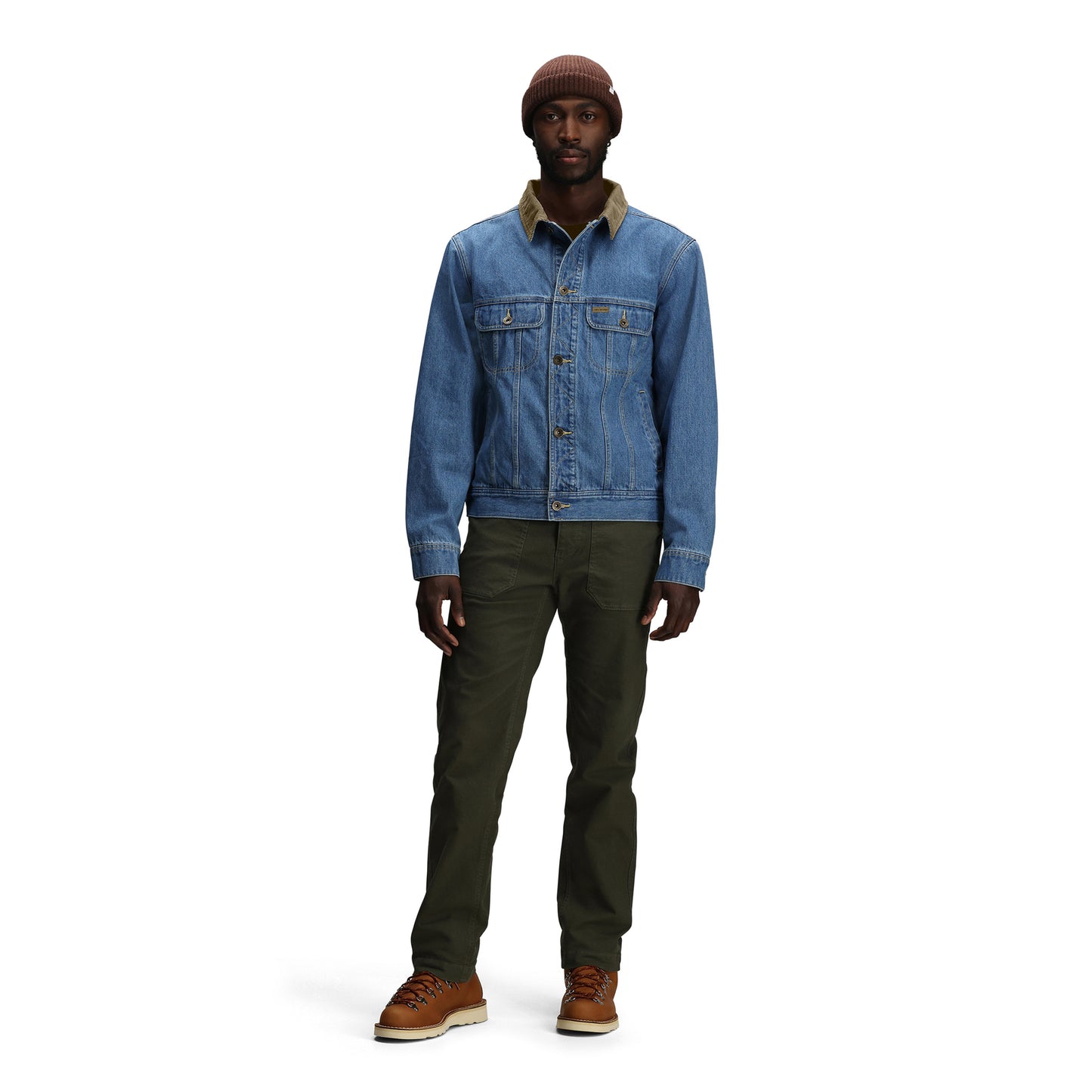 General front model shot of Topo Designs Sightseer Jean Jacket - Men's in "Mid Denim"