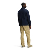 General back model shot of Topo Designs Utility Jacket - Men's in "Midnight"