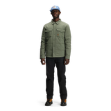 General front model shot of Topo Designs Puffer Shirt Jacket - Men's in "Beetle"