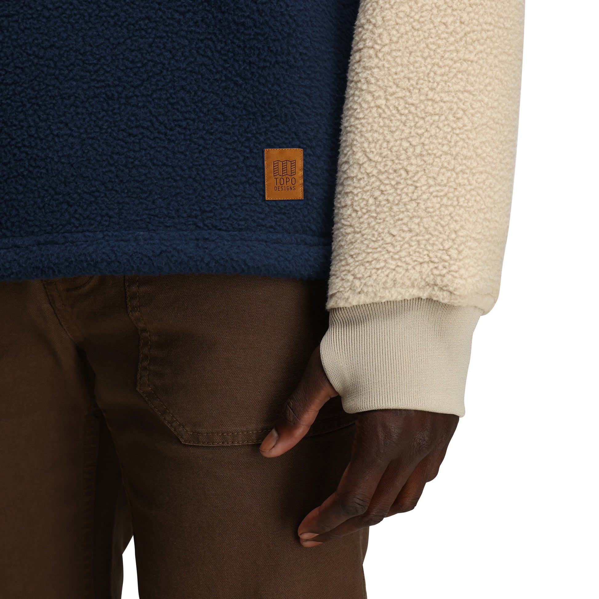 General Detail shot of Topo Designs Mountain Fleece Crewneck - Unisex in "Midnight / Oatmeal"