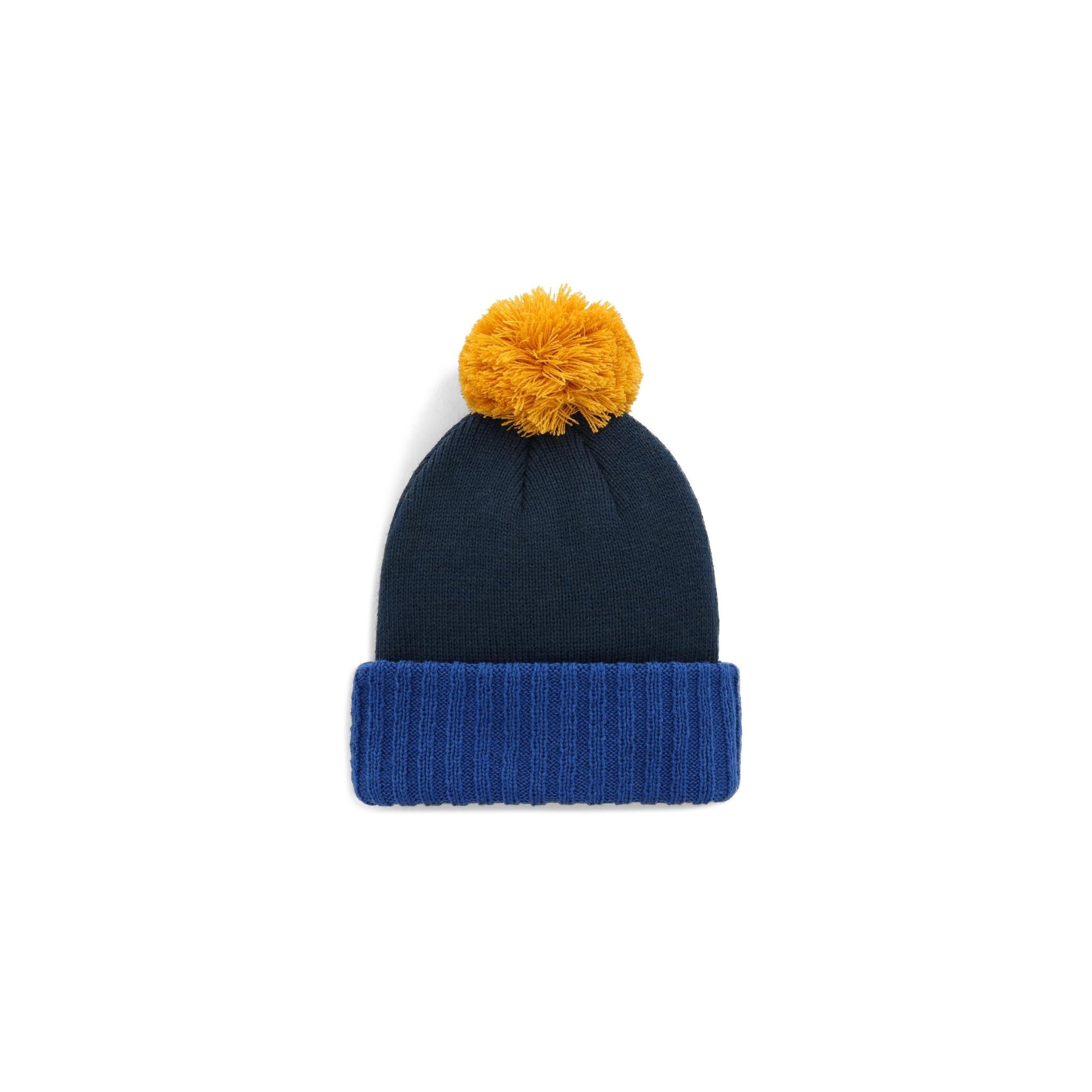 Back View of Topo Designs Pompom Beanie in "Cobalt / Midnight"