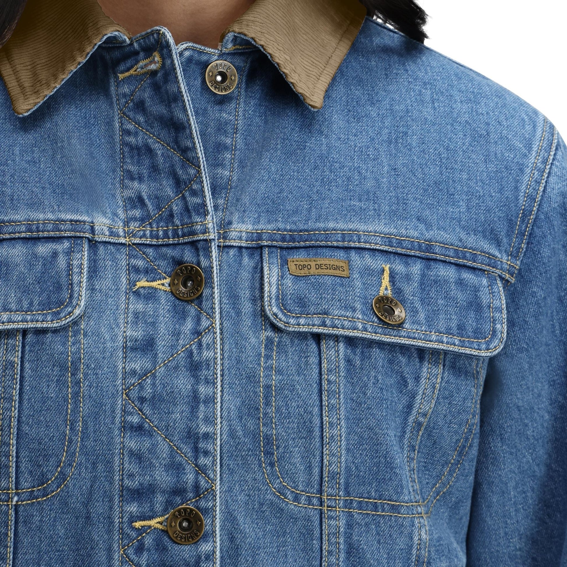 General Detail shot of Topo Designs Sightseer Jean Jacket - Women's in "Mid Denim"