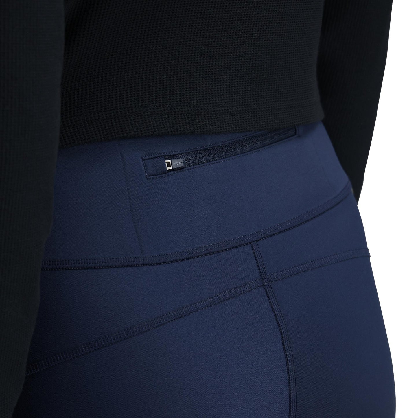 General Detail shot of Topo Designs StayWarm Trail Legging - Women's in "Midnight / Stone Blue"