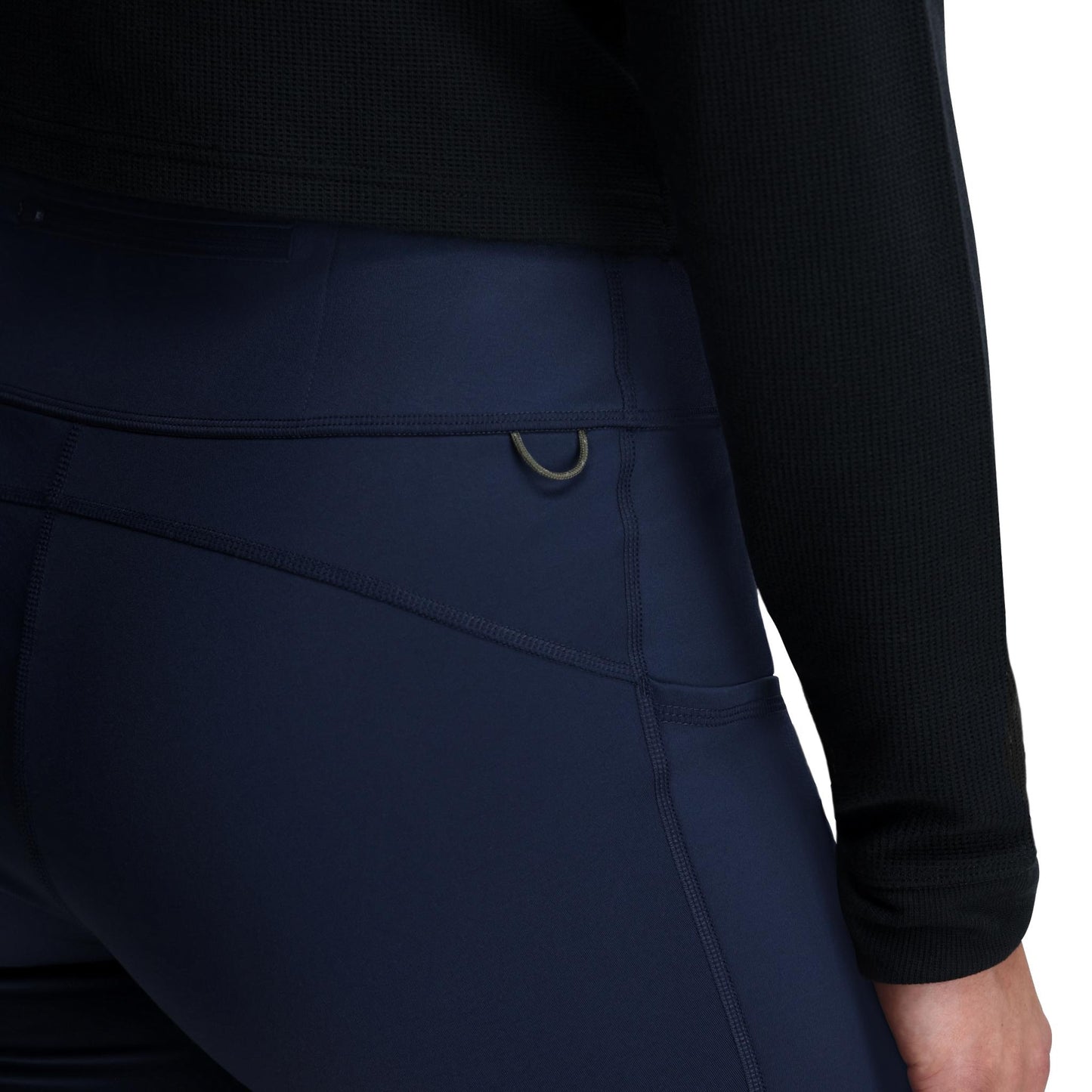 General Detail shot of Topo Designs StayWarm Trail Legging - Women's in "Midnight / Stone Blue"