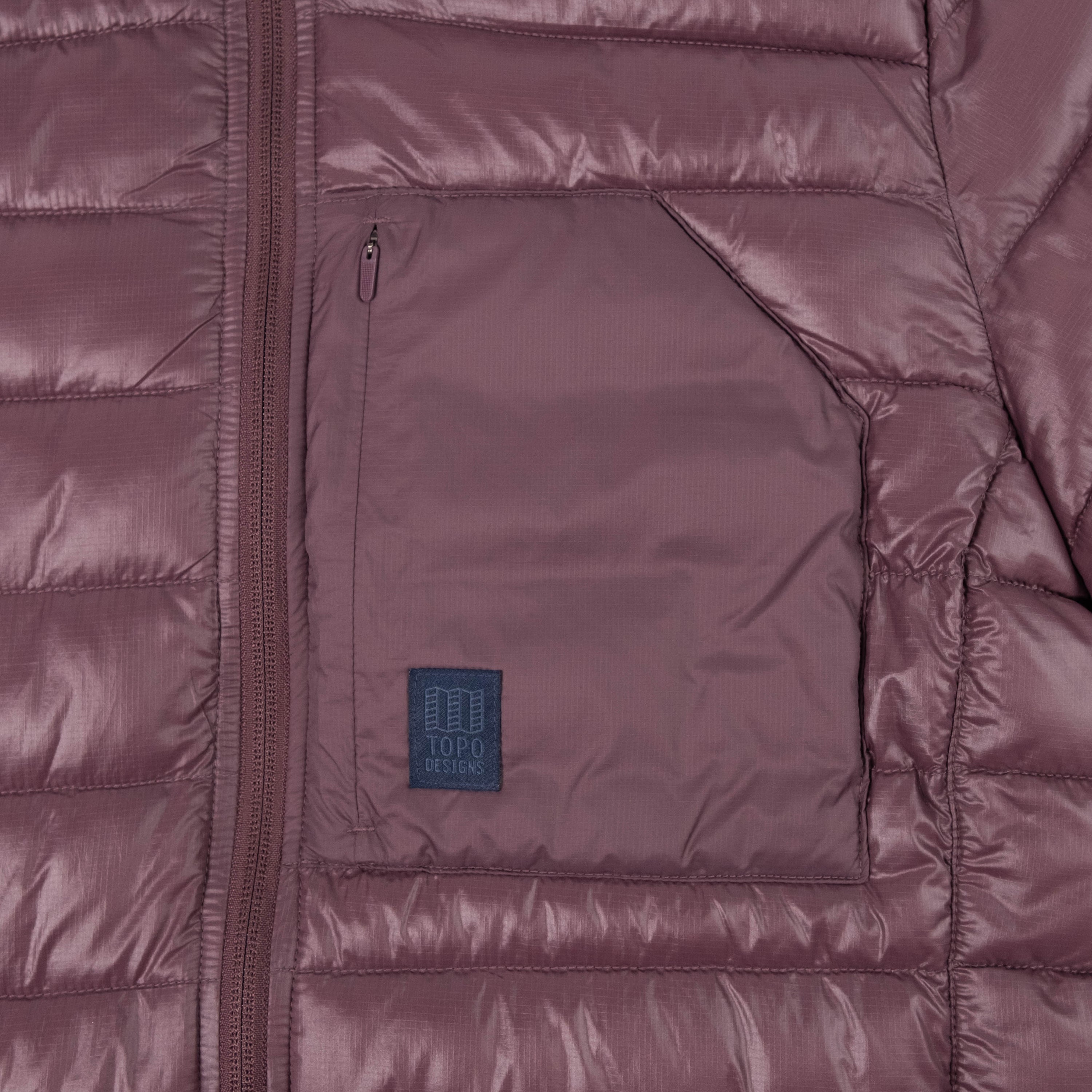 General Detail shot of Topo Designs Townie Puffer Jacket - Women's in "Huckleberry"