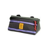 Front quarter view of Topo Designs Bike Bag in "Very Peri / Forest"