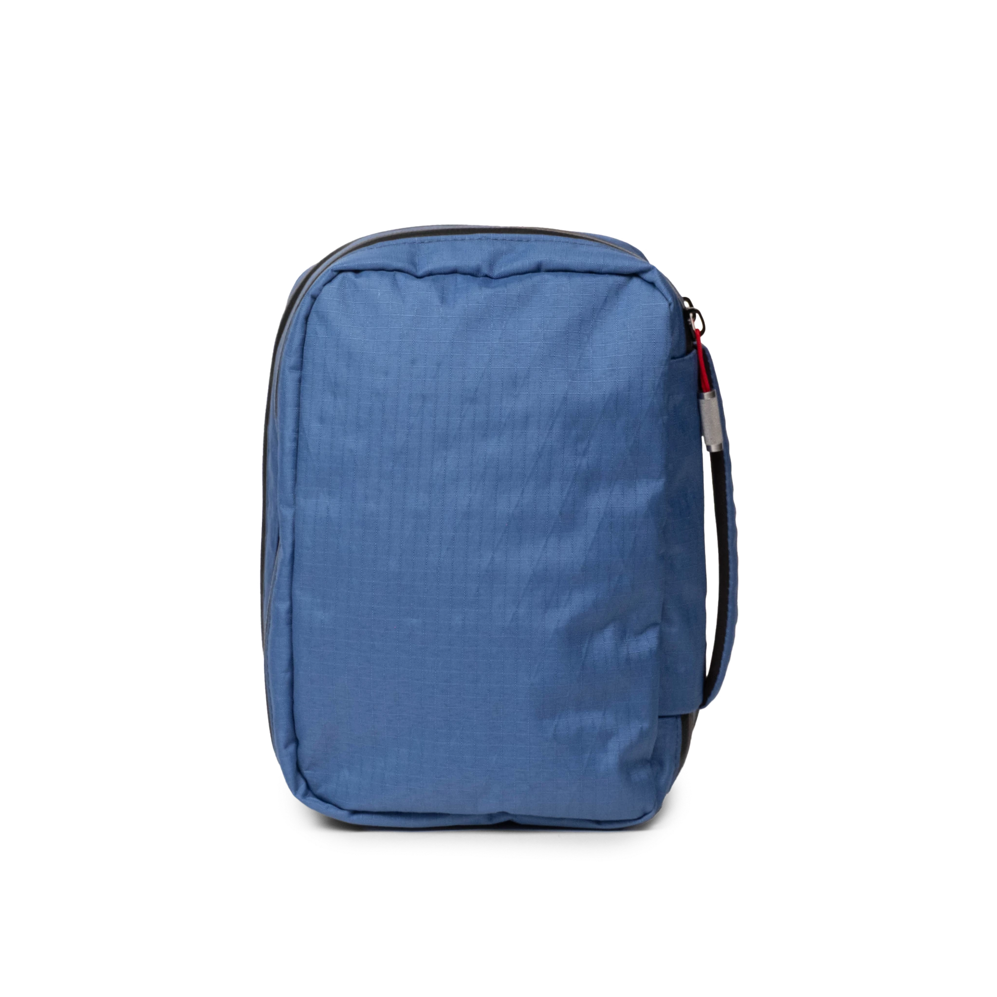 Back view of Topo Designs Global Pro Tech Case in "Ocean Blue"