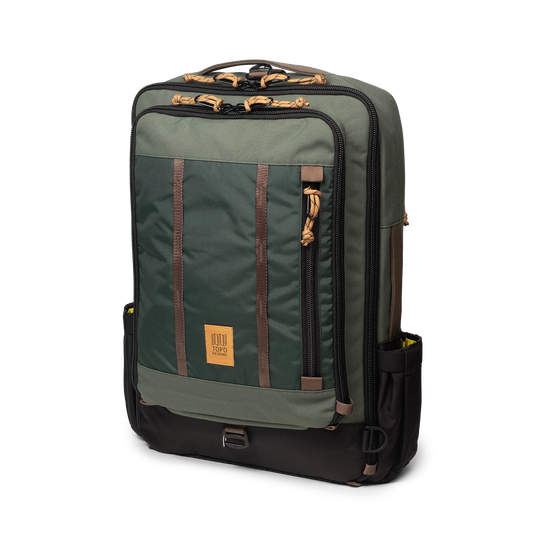 Topo Designs Global Travel Bag 30L Durable Carry On Convertible Laptop Travel Backpack in "Woodland / Forest".