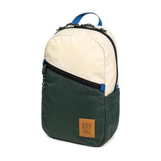 Front view of Topo Designs Light Pack in "Forest / Bone White"