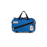 Front view of Topo Designs Mini Quick Pack in "Classic Blue"