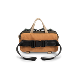 Back view of Topo Designs Mini Quick Pack in "Woodland / Brown Oak"