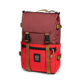 Front quarter view of Topo Designs Rover Pack Classic in "Maroon / Salsa"