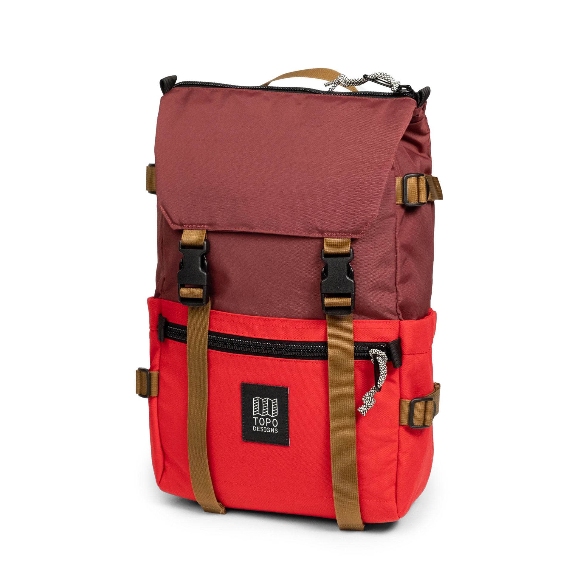 Front quarter view of Topo Designs Rover Pack Classic in "Maroon / Salsa"