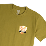 Front detail shot of Topo Designs x CCH x Pine Printshop Golden Trout Tee in "Moss"
