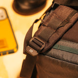 General lifestyle shot of Topo Designs Global Pro Backpack showing strap hardware