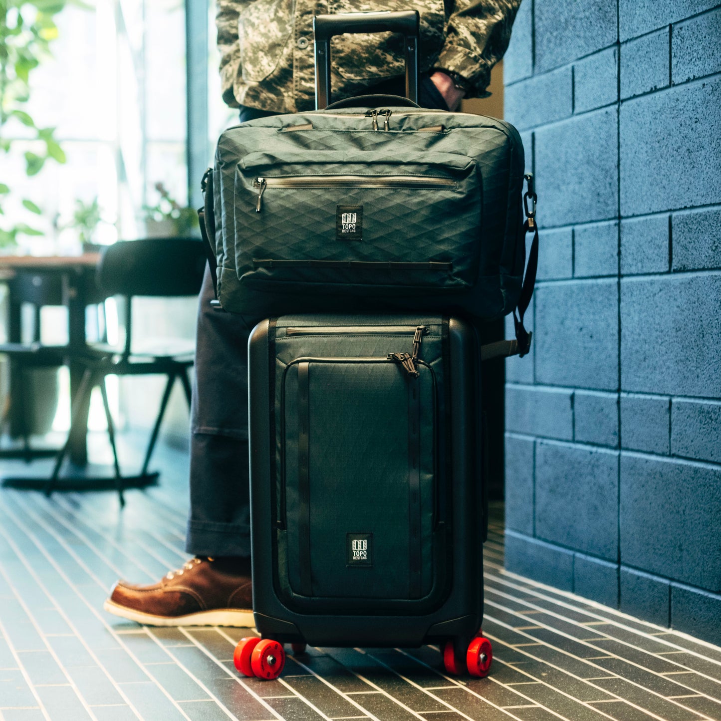 General shot of Topo Designs Global Pro Travel Roller in lifestyle setting