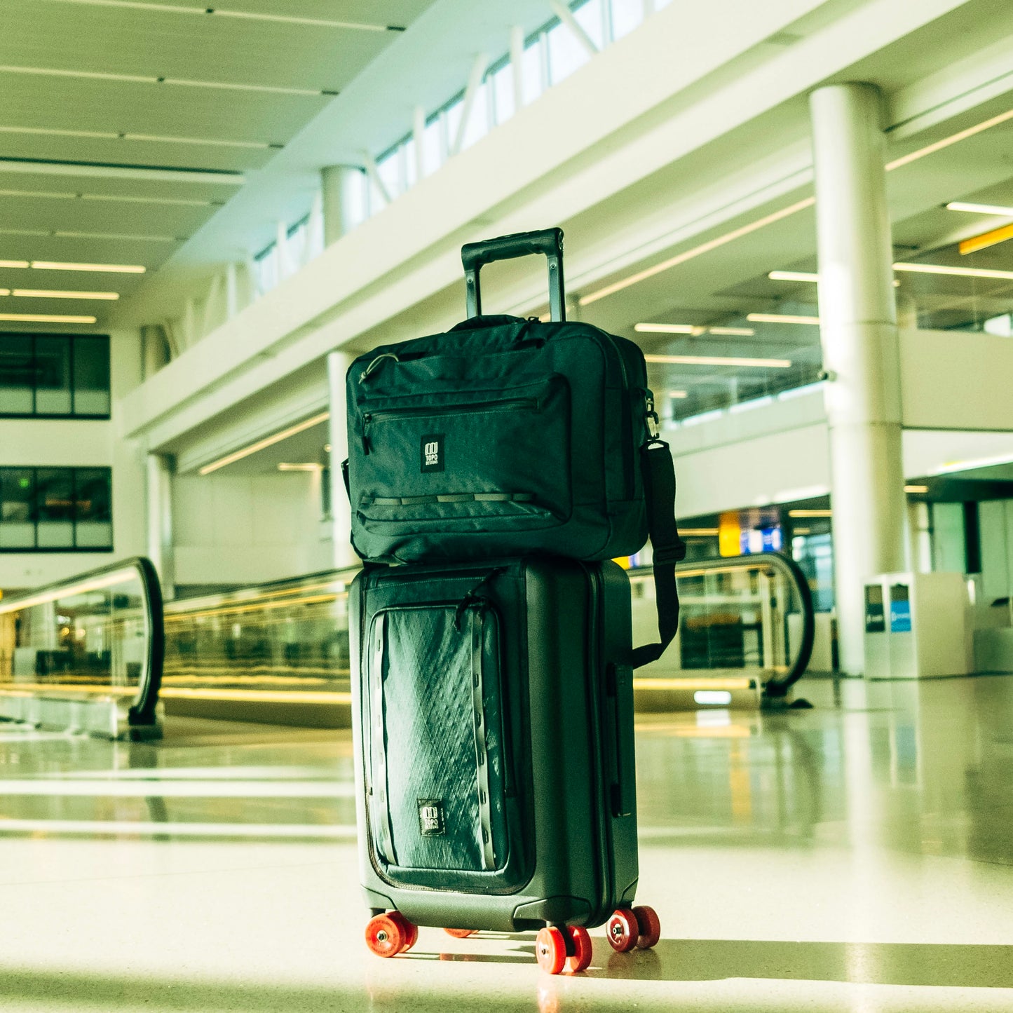 General shot of Topo Designs Global Pro Travel Roller in airport setting