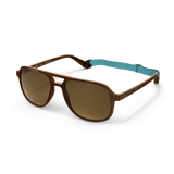 General angled view of VALLON X Topo Designs sunglasses in "Brown / Brown" with sunglass arms open and strap attached.