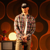 General shot of Person wearing a "Black / Goldenrod Multi" Mountain Shirt Lightweight with a dark background