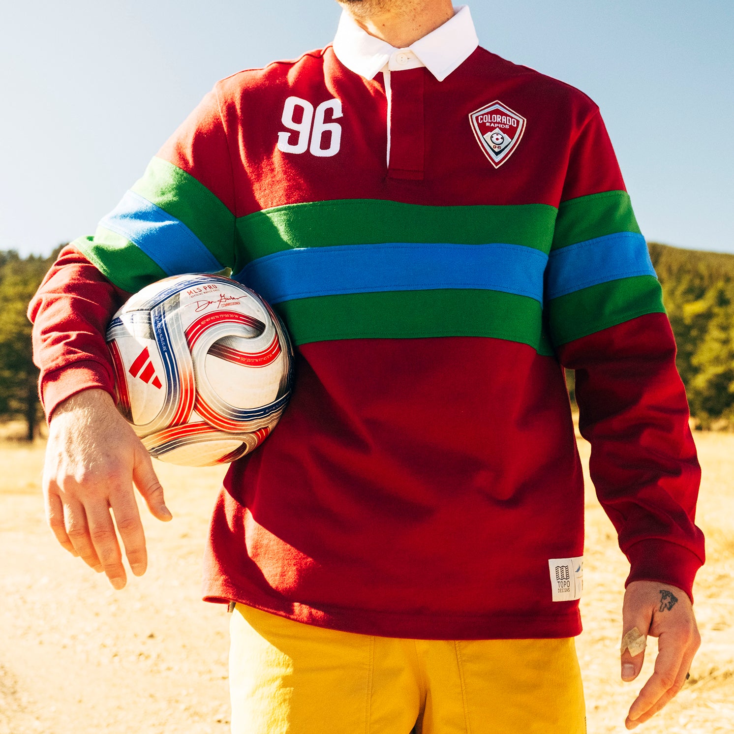 General lifestyle shot of Topo Designs x Colorado Rapids Mountain Rugby Shirt