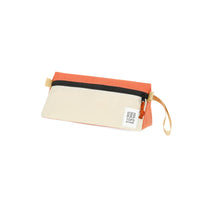 Topo Designs Dopp Kit toiletry travel bag in recycled "Bone White / Coral - Recycled" pink nylon.