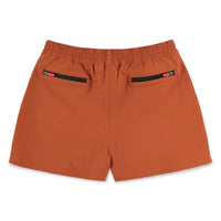 Back zipper pockets on Topo Designs Women's Global lightweight quick dry travel Shorts in "Brick" orange.