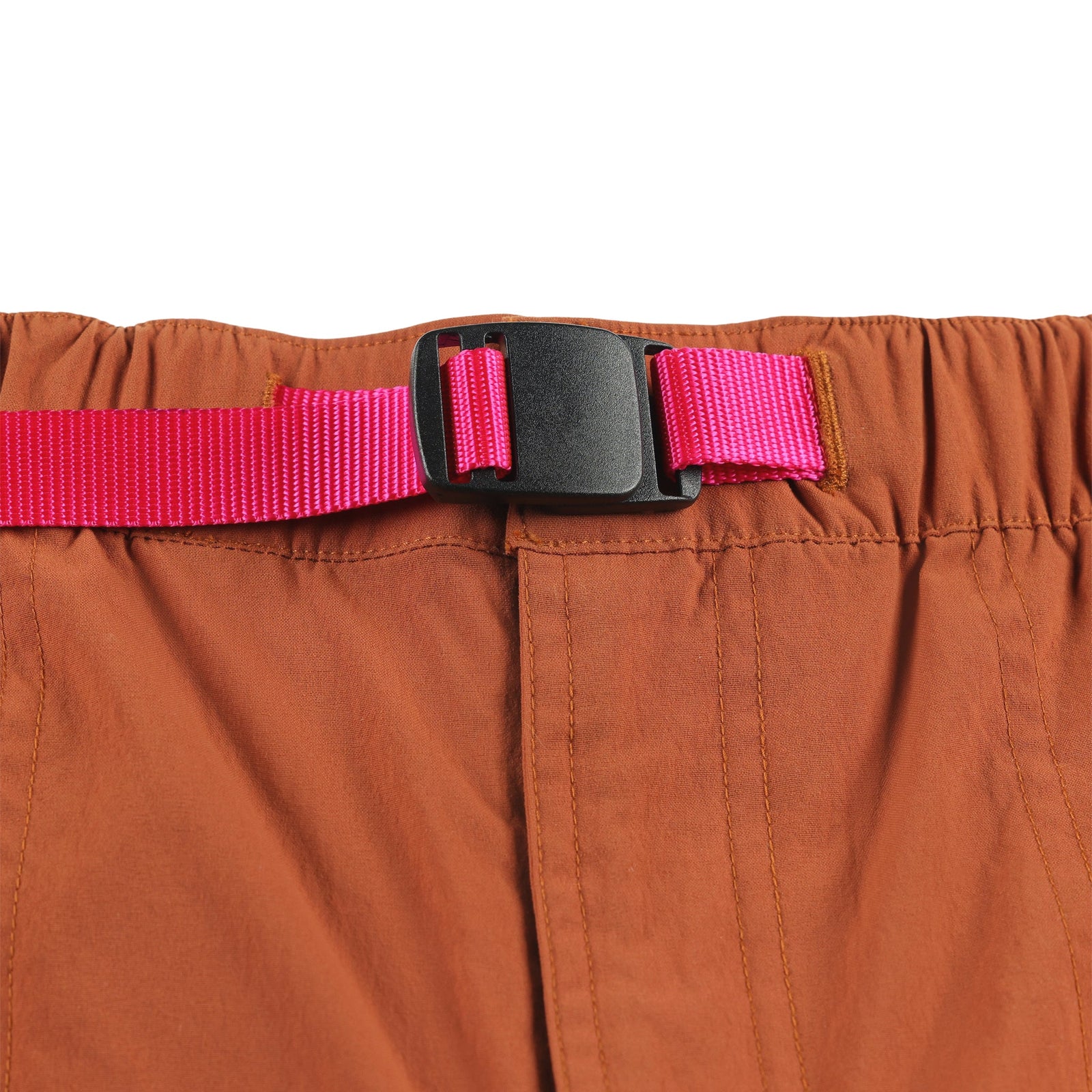 General Web belt on Topo Designs Women's River quick-dry swim Shorts in Brick orange.