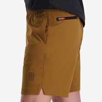 General on model photo of side pocket on Topo Designs Men's Global lightweight quick dry travel Shorts.