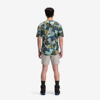 General on model back shot of Topo Designs Men's River Tee Short Sleeve UPF 30+ moisture wicking t-shirt in "Green Camo" green.