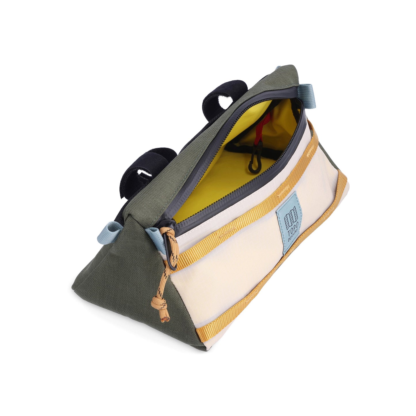 Inside photo of the Topo Designs Mountain Bike Bag handlebar pack with removable shoulder strap in "Bone White / Olive" lightweight recycled nylon.