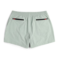 Back view of Topo Designs Women's Global lightweight quick dry travel Shorts in "Light Mint" green.