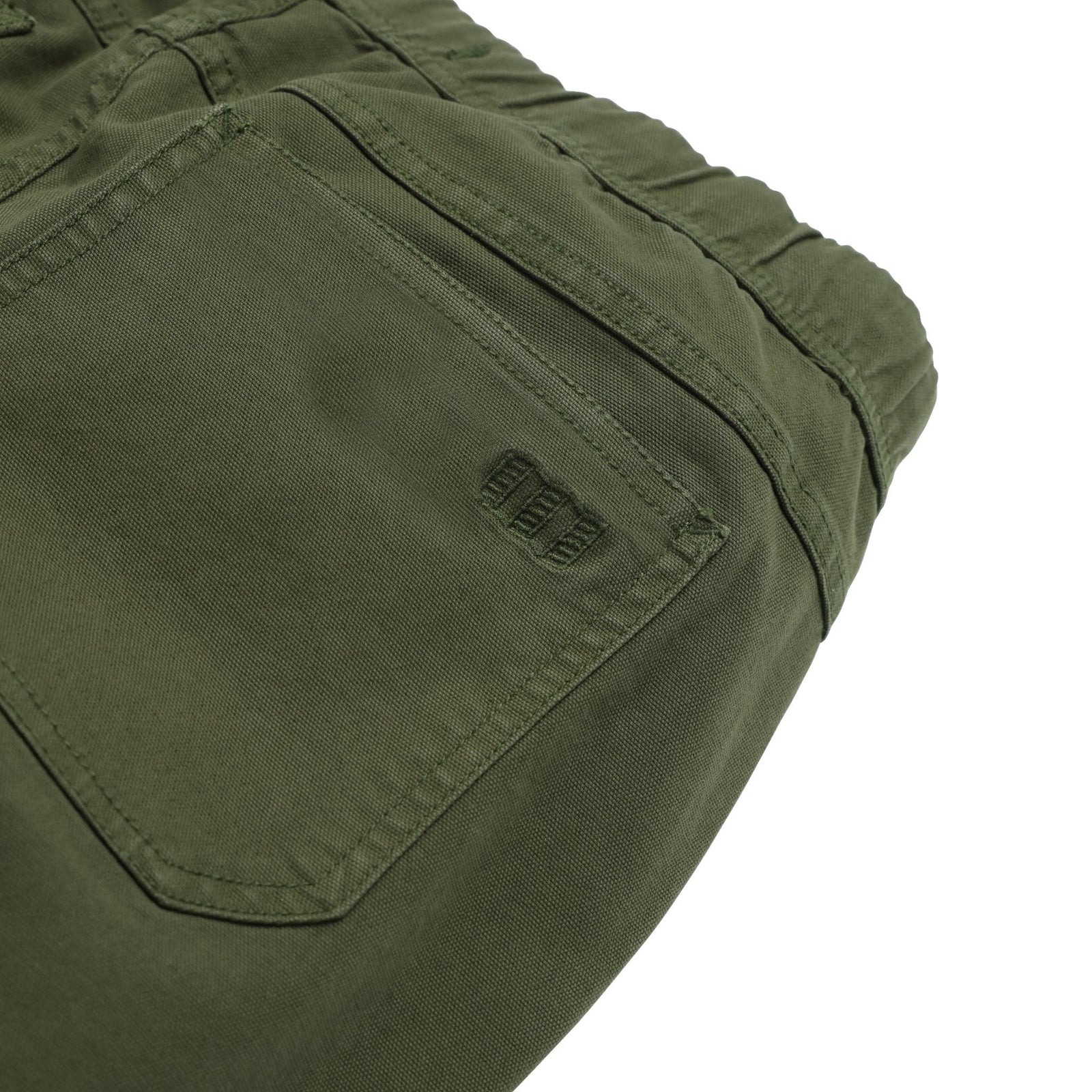 Detail shot of Topo Designs Dirt Pants Slim - Women's in "Olive"