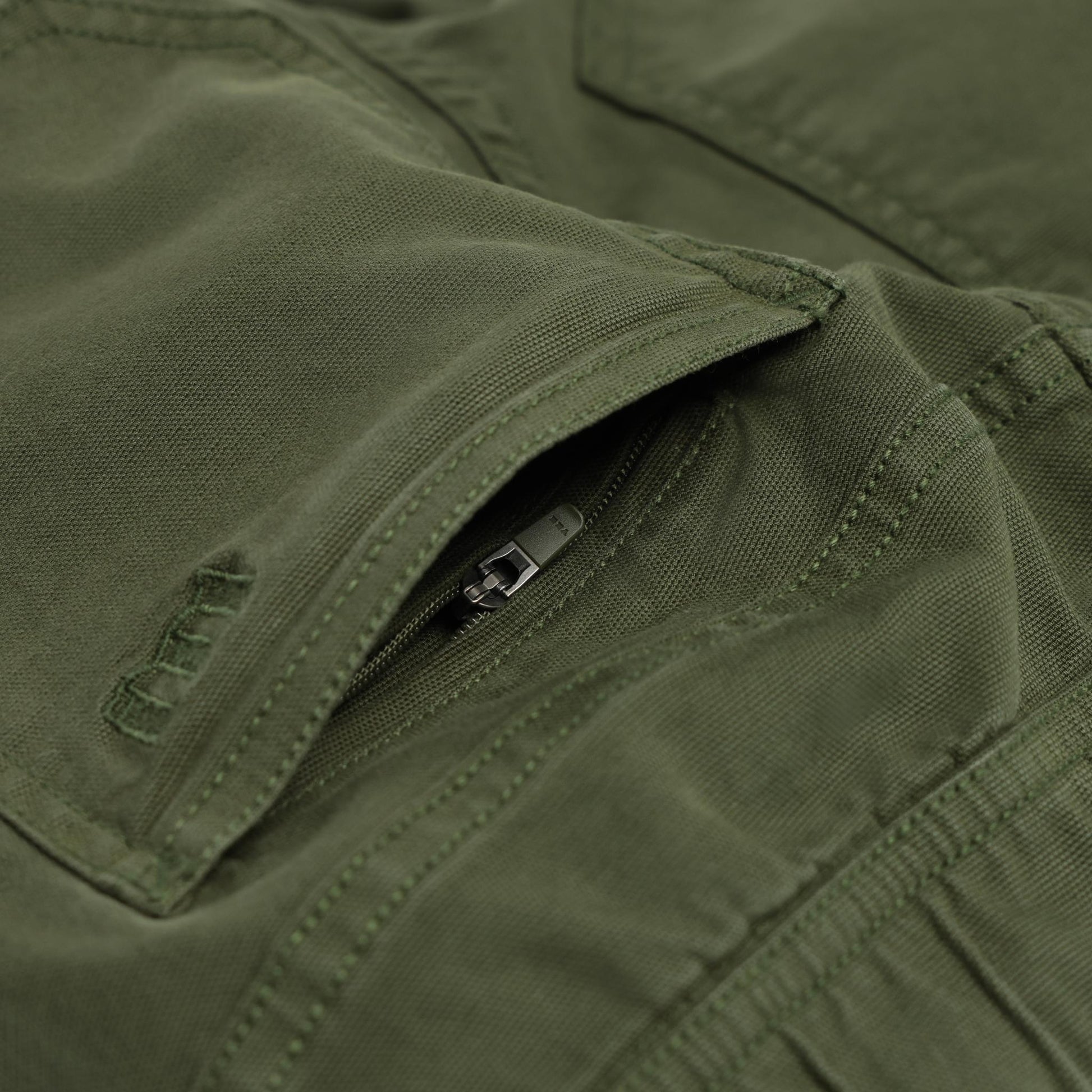 Detail shot of Topo Designs Dirt Pants Slim - Women's in "Olive"