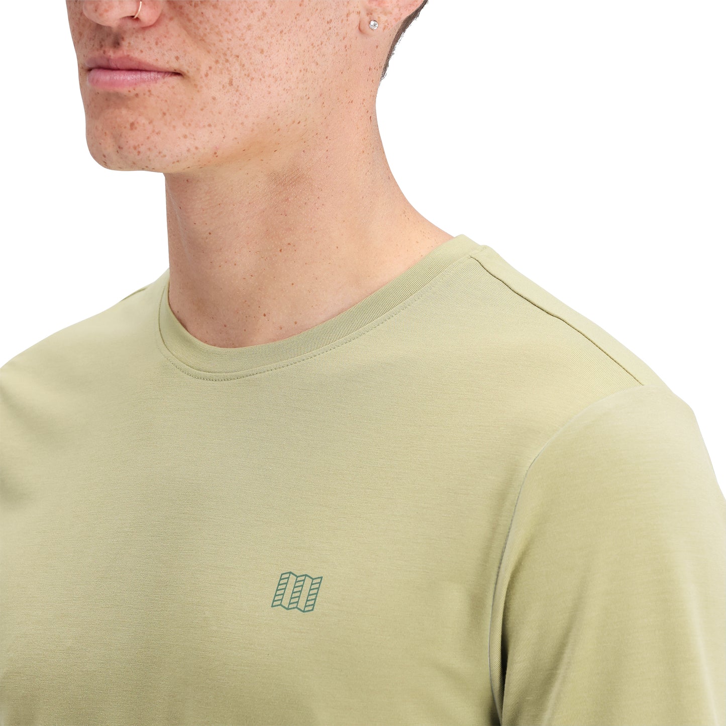 Detail shot of Topo Designs Global Tek Crew Ss - Men's in "Moss"