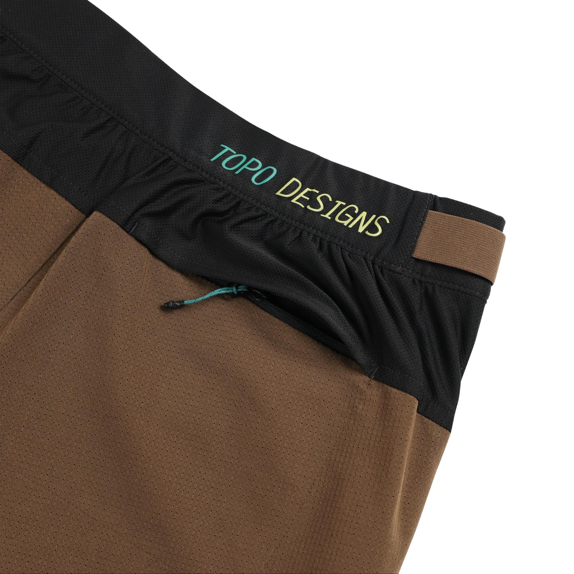 Detail shot of Topo Designs Global Trek Shorts 7" - Men's in "Desert Palm"