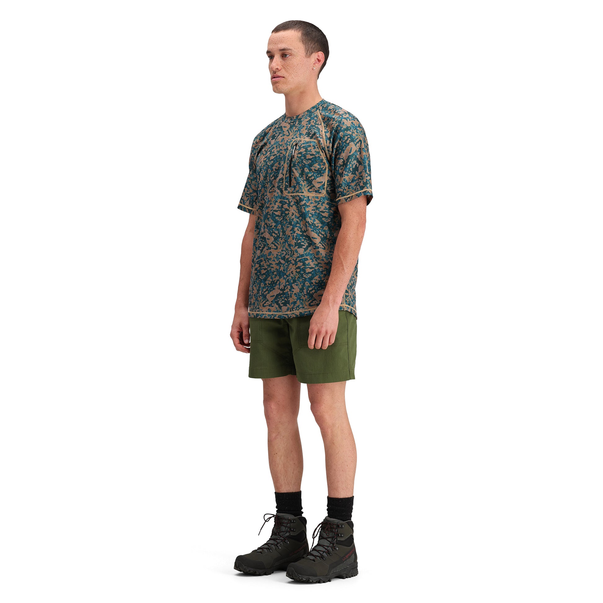 General side model shot of Topo Designs Mountain Short Ripstop - Men's in "Olive"