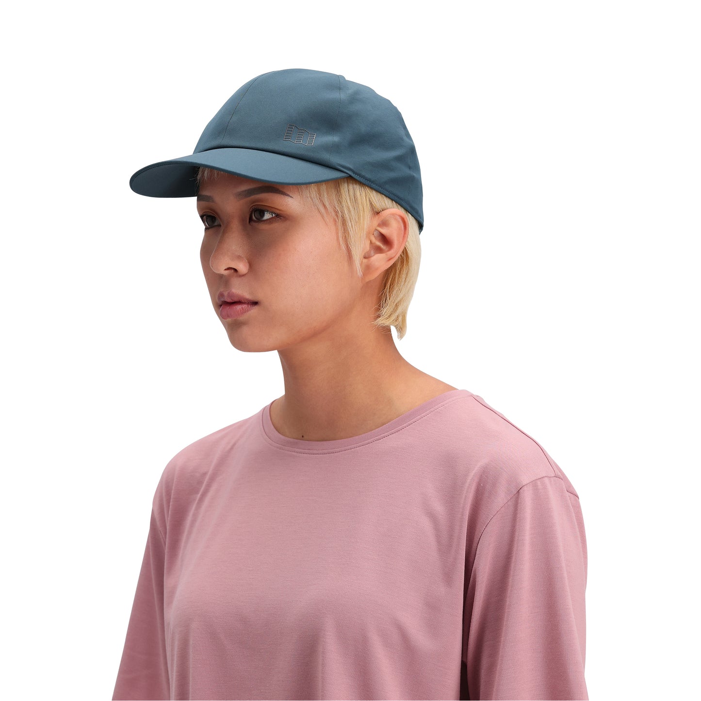 General front model shot of Topo Designs Global Tech Cap in "Pond Blue"